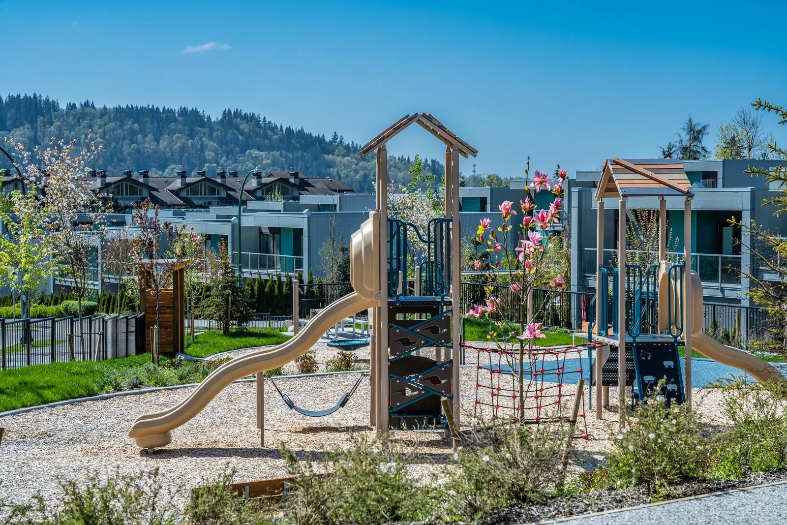 Playground with slides and climbing structures at Seymour Village Amenity Park