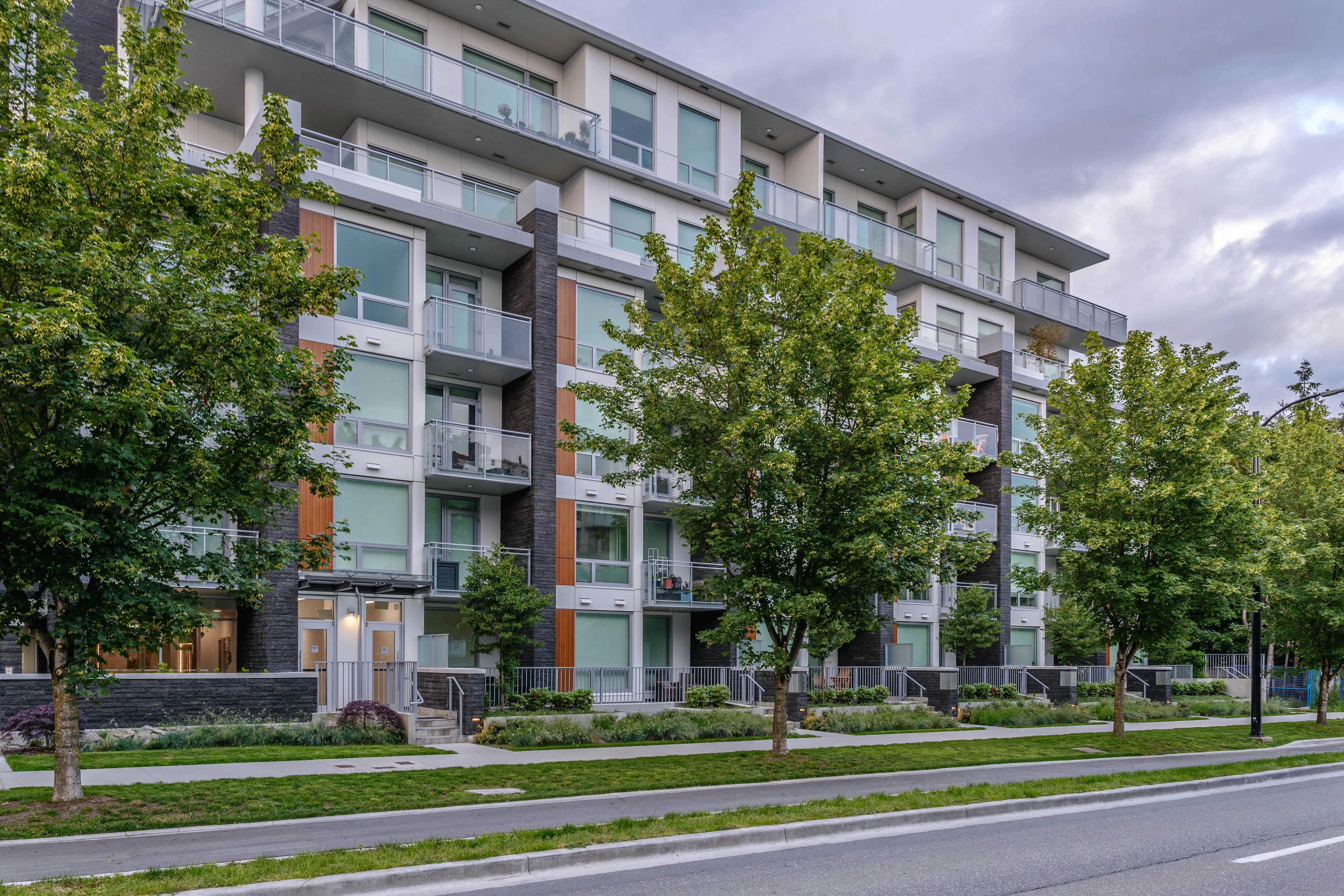 Street trees and boulevard planting along a residential building at Basalt
