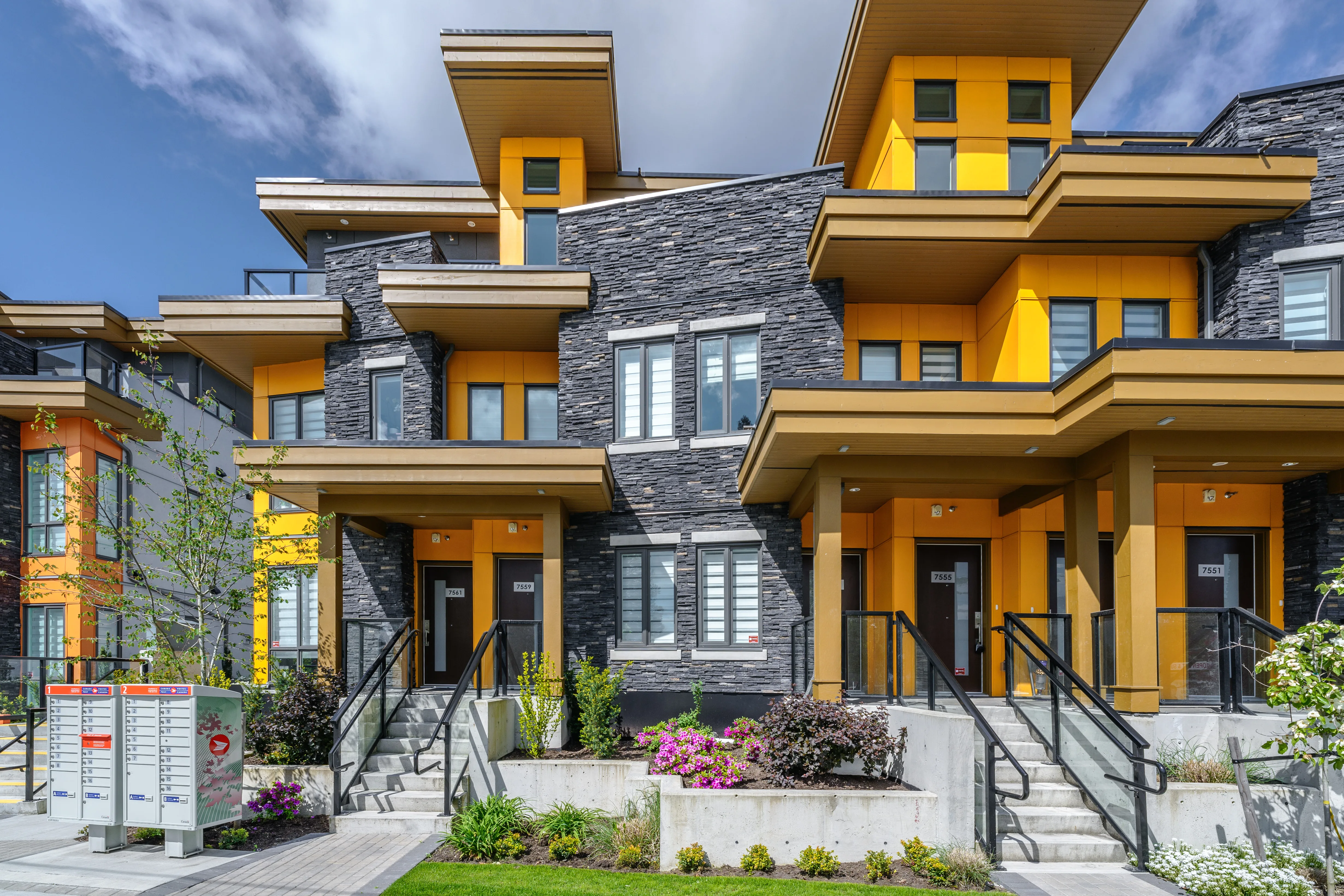 Entry stairs and planting at a row of townhomes at Terraces at Oak Park
