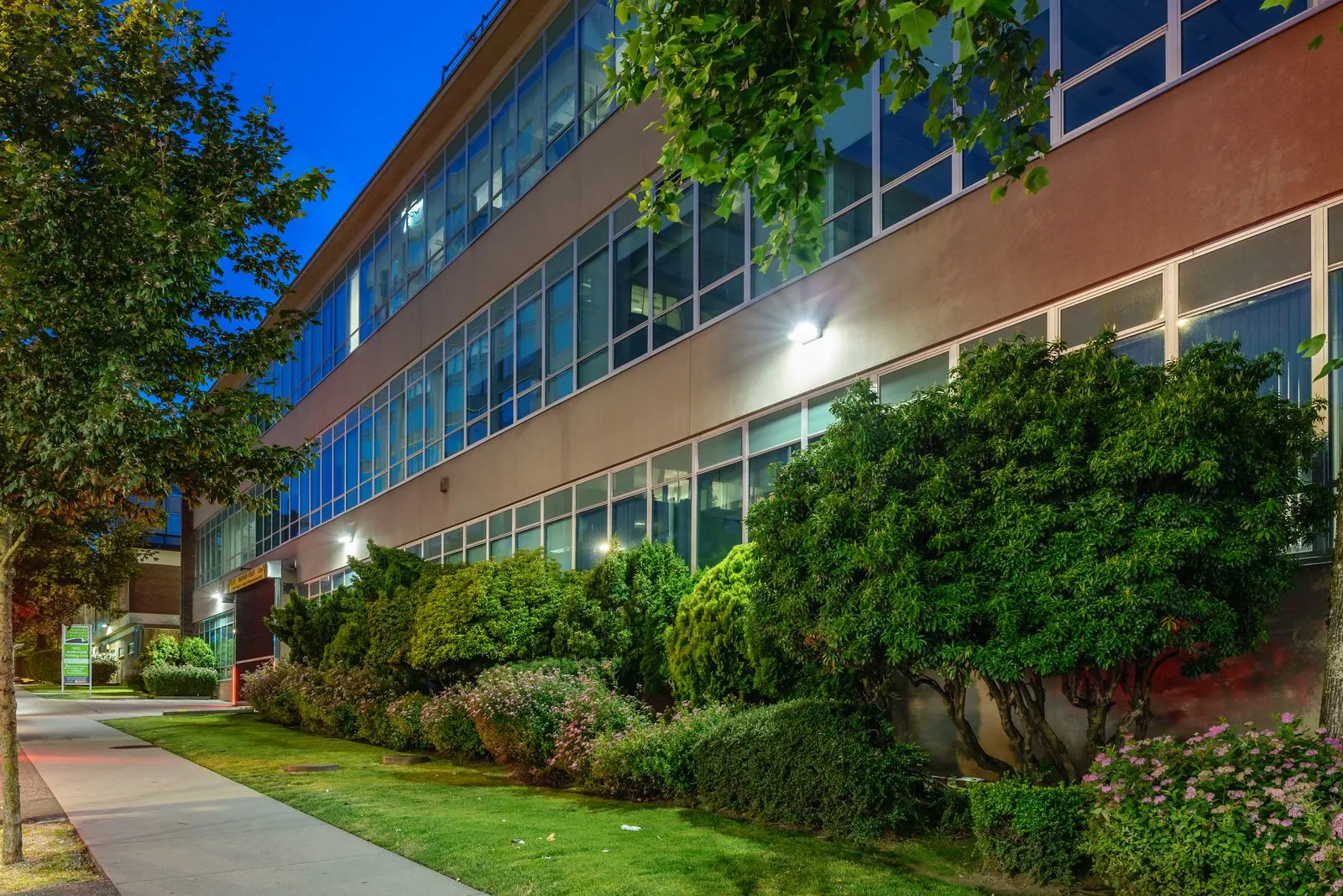 Lawn and shrub planting along a campus building at Vancouver Community College