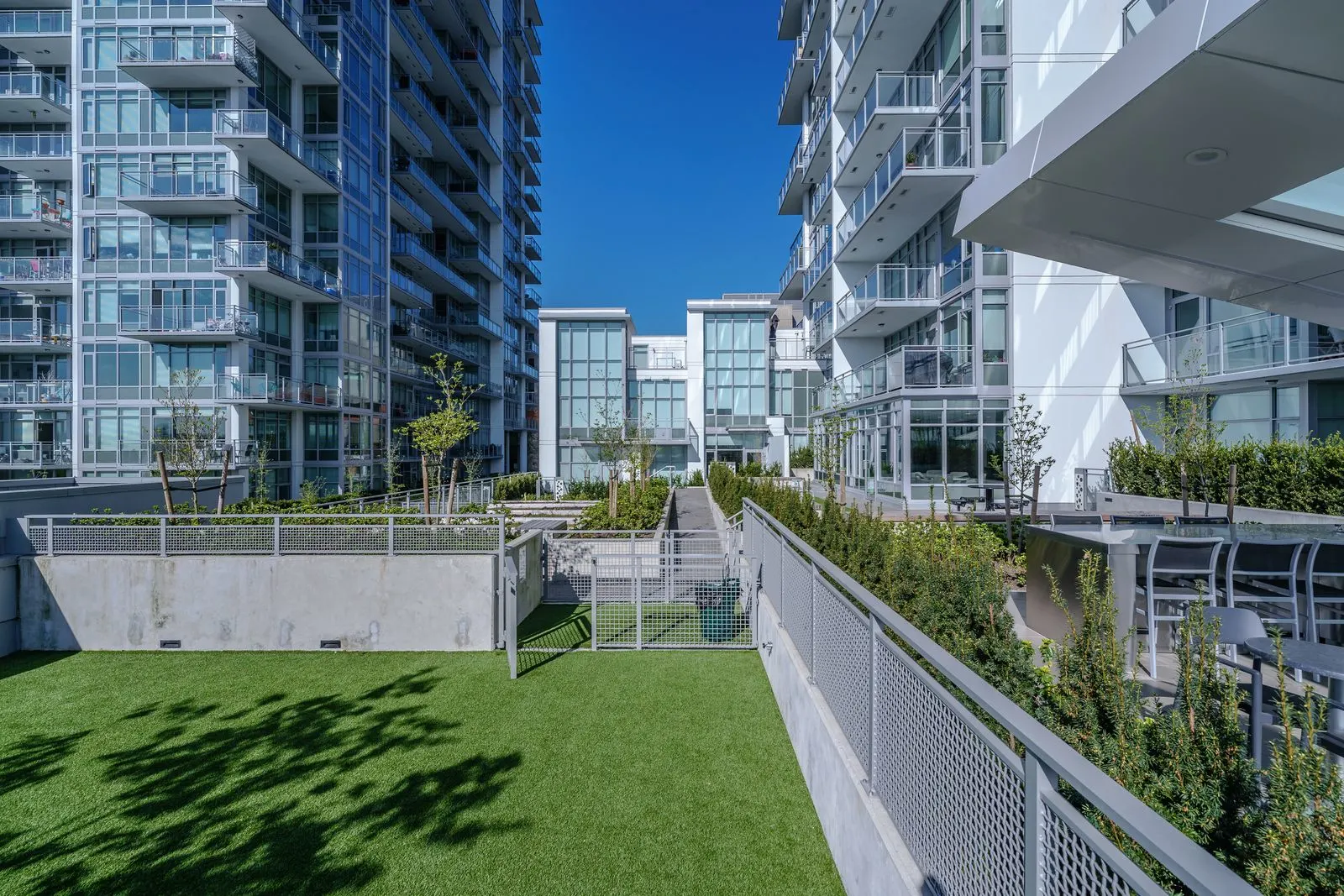 Courtyard lawn between residential towers at Brewery District 6