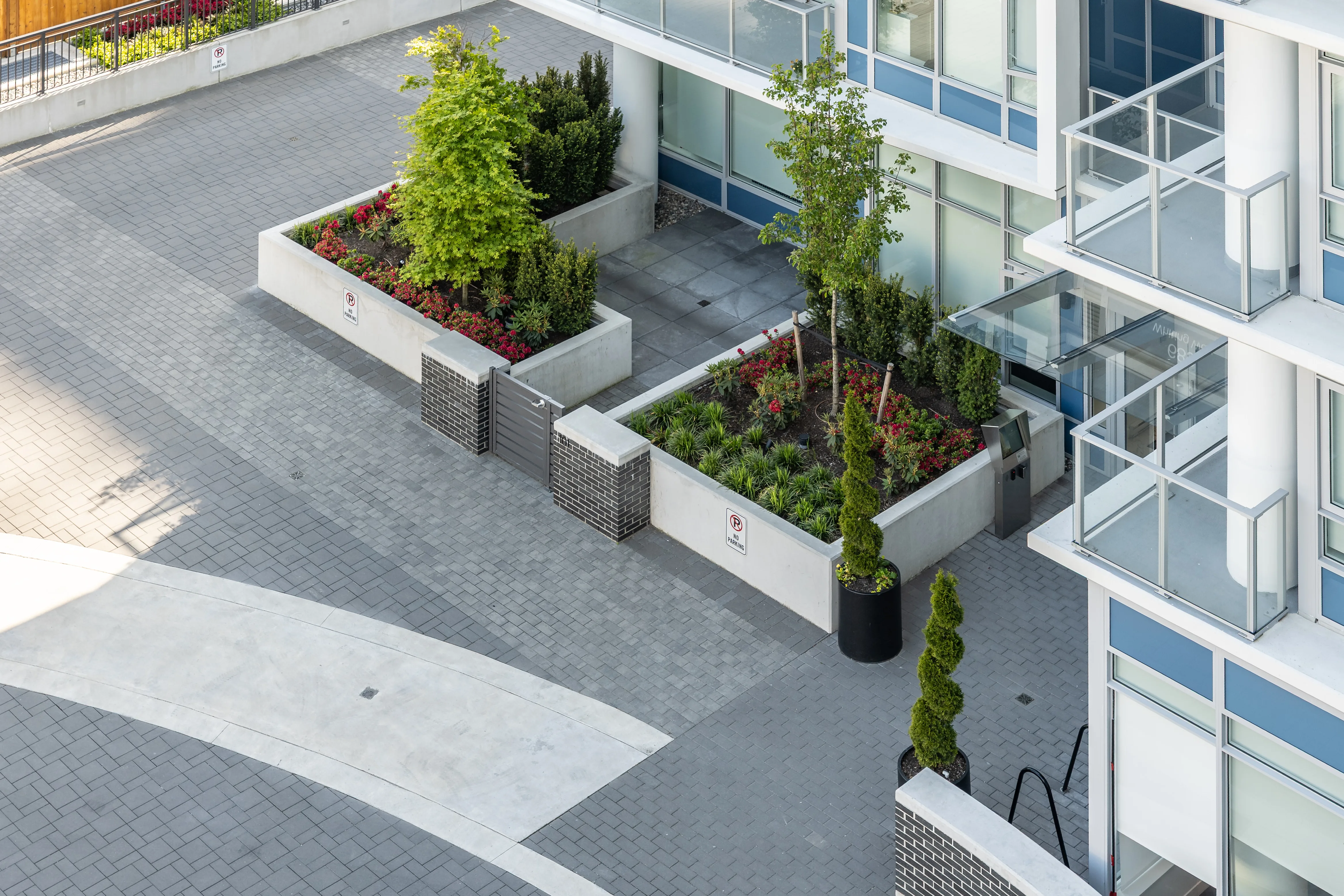 Overhead view of raised planters on a terrace at Precidia
