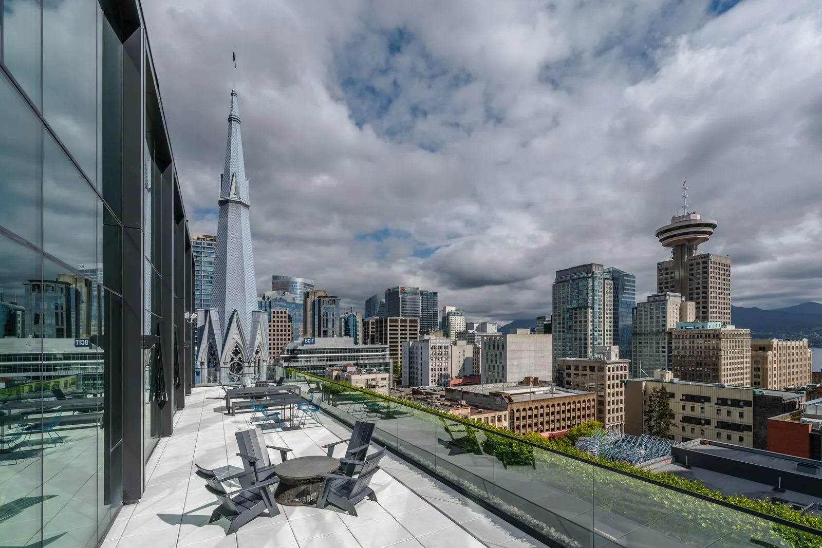 Rooftop terrace seating with city skyline views at Amazon Downtown